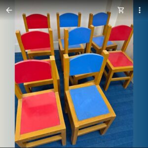 Set of colorful red and blue children's chairs for classroom use