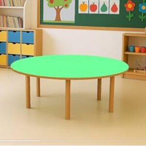 Bright classroom setup with round green table and learning materials